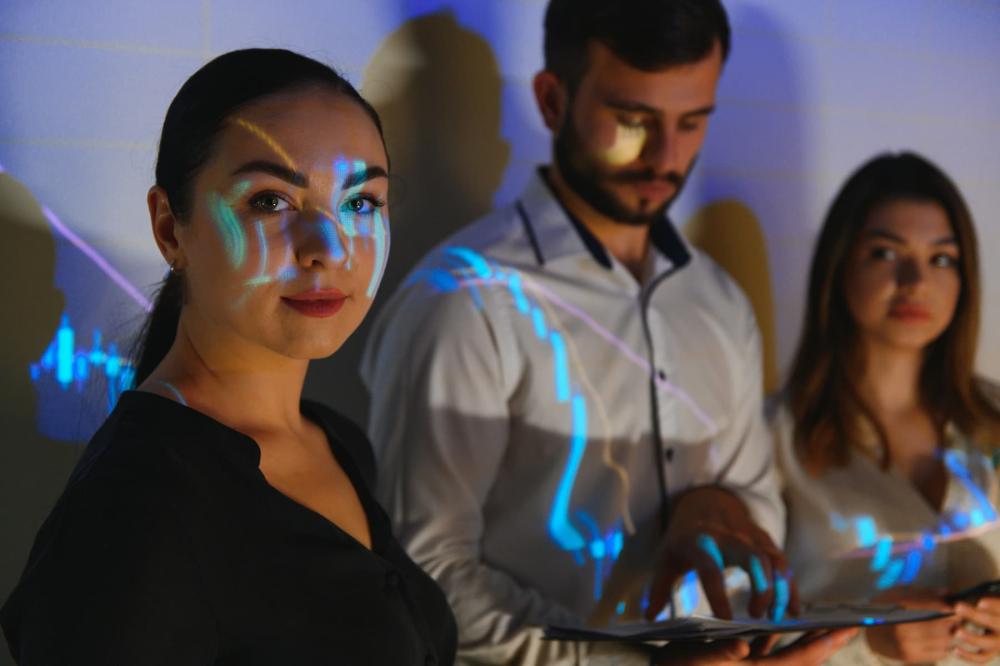 tres jóvenes están n una sala de realidad virtual